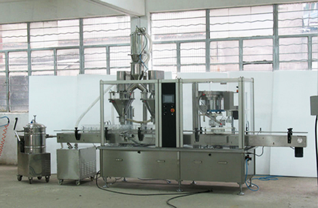 2 heads filling capping machine pharma bottles çift kafalı toz paketleme makinesi.jpg