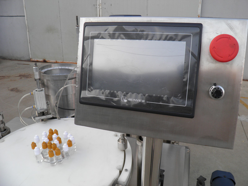 filling plugging capping labeling production line E sıvı PLC şişe dolum kapatma etiketleme.jpg