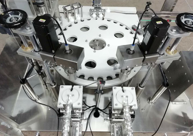 şişe robot kol besleyici.jpg