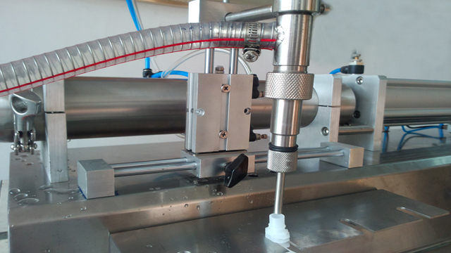 single head filling machine for spout bags with hopper musluk dolgusu.jpg