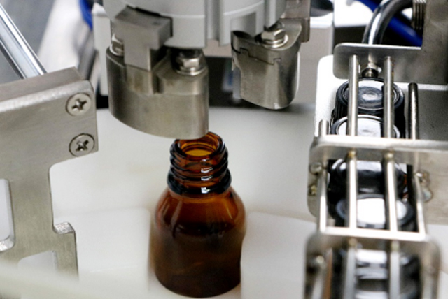 yağ şişeleri dolum makinesi masa üstü.jpg